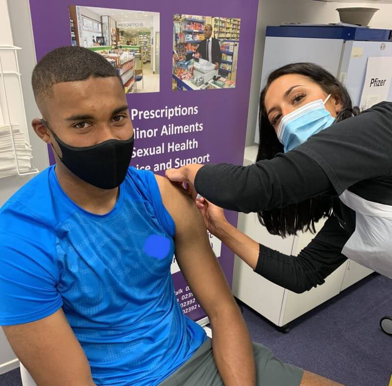 Portsmouth FC player getting vaccinated