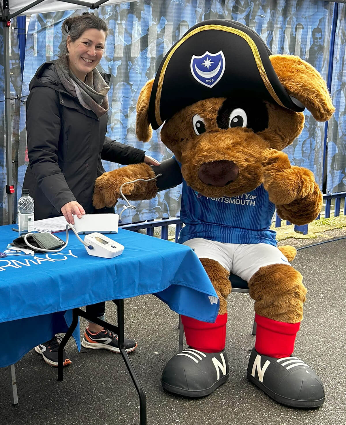 Portsmouth FC mascot having blood pressure check